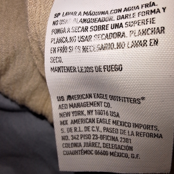 An American Eagle sheer and lace low-cut blouse in a size medium. - Picture 7 of 9